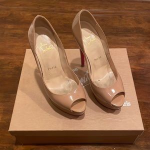 Christian Louboutin nude leather pumps
